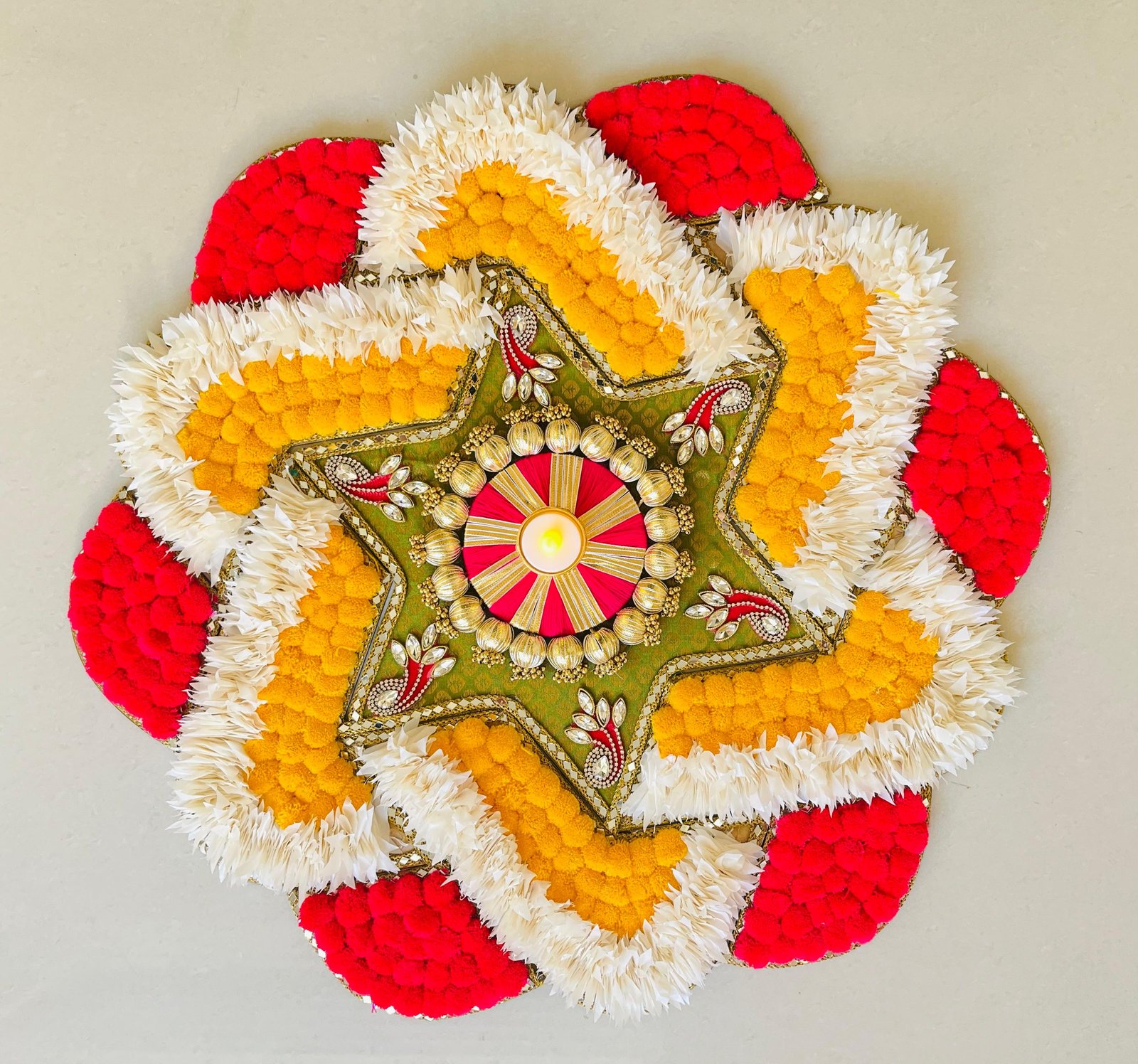 Handcrafted Fabric, Pom-Pom, and Flower Rangolis